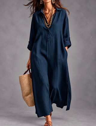 Margaret V-neck maxi shirt dress in navy with a straw bag